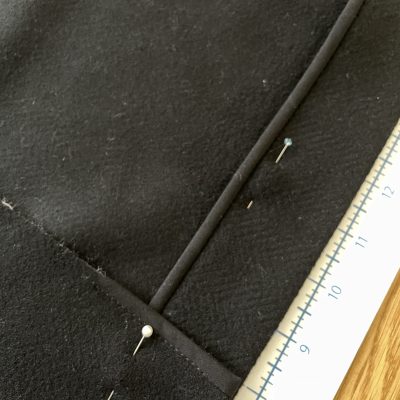 Bound raw edges at the hem that would have otherwise been visibly raw.