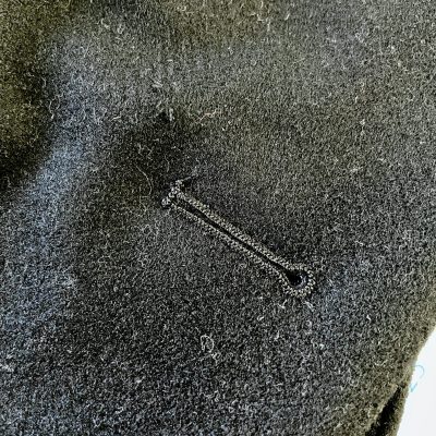 Professionally made buttonhole.